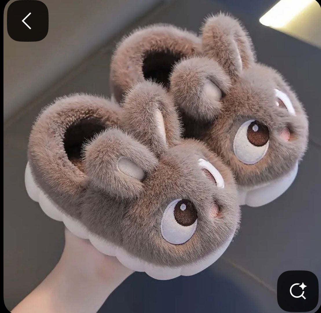 plush bunny slippers with a platform sole.